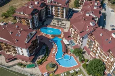 an aerial view of a resort with a swimming pool at Belvedere Holiday Club VIP Apartment H 82 in Bansko