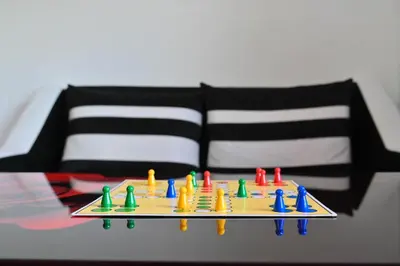 a table with a tray with colorful toys on it at Discovery Apartment Bansko in Bansko