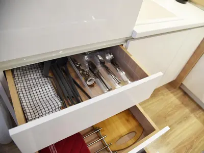 a drawer in a kitchen with tools in it at Borovets Gardens Luxury apartment E11 in Borovets