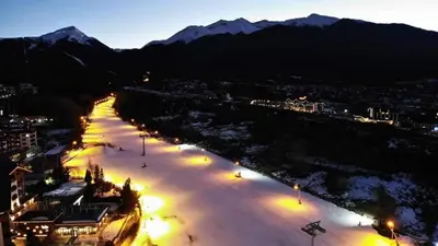 a view of a river at night with lights at Bansko Royal Towers - Studio 153 in Bansko