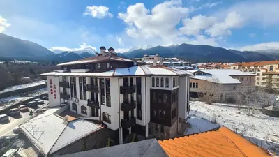 an aerial view of a building with snow on the roof at Bansko Royal Towers - Studio 153 in Bansko