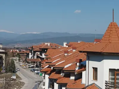 a view of a town with red roofs at Старият Хан-Б24 in Bansko