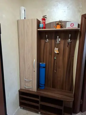 a wooden cabinet with a blue trash can in it at The View in Sandanski