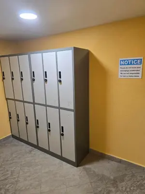 a row of lockers in a locker room at Lovely 2-bedroom serviced apartment with SPA in Bansko