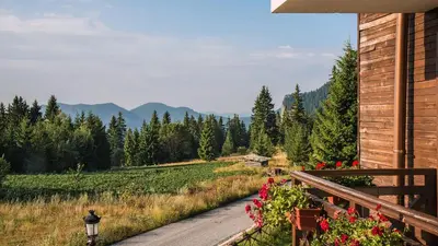a porch of a house with a view of a mountain at Studio by Mountain Lakes in Ezerovo