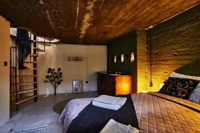 a bedroom with a bed and a wooden ceiling at COURTHOUSE #4 EXCLUSIVE Top Center PRIVATE GARDEN in Sofia