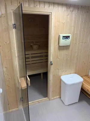 a small bathroom with a shower and a toilet at Луксозна вила - Стрелча, джакузи с минерална вода in Strelcha