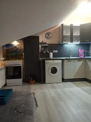 a kitchen with a sink and a washing machine at IGLIKA 2 SNOWY NIGHT V 31 in Borovets