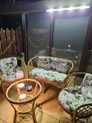 a group of chairs and a table in a room at Юндовата къща in Beli Iskar