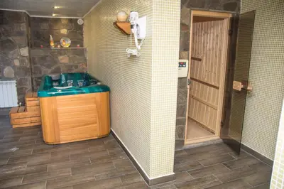 a bathroom with a sink and a shower at Villa Zaburdo in Zabŭrdo