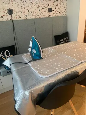 a bed with a fish pillow on top of it at LUXURIOUS ONE BEDROOM STUDIO IN TOP CENTER in Blagoevgrad