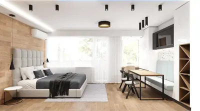 a bedroom with a bed and a desk and a television at LUXURIOUS ONE BEDROOM STUDIO IN TOP CENTER in Blagoevgrad