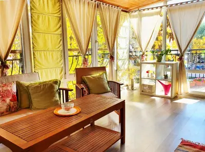 a living room with a couch and a table at Apartment Nicole in Plovdiv