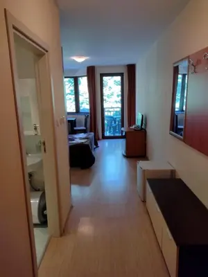 a view of a living room with a bathroom and a living room at Стаи и апартаменти под наем in Borovets