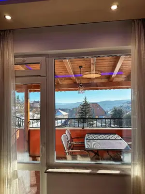 a view from the balcony of a house at Hotel Diamant in Dospat