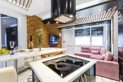a living room with a table and a couch at Modern 1BD Flat with a Parking near the city centre by Flat Mаnager in Plovdiv