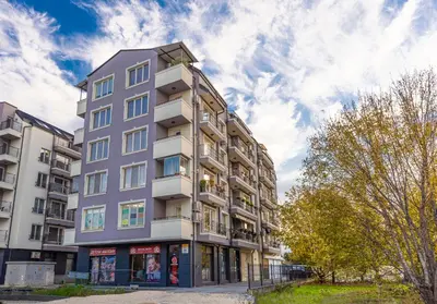 an apartment building with a purple at Beautiful 1BD Apartment with a Parking Spot by Flat Mаnager in Plovdiv