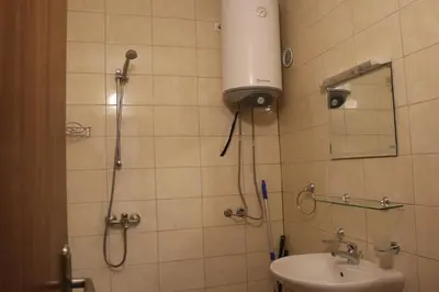 a bathroom with a shower and a sink at Winter Аpartments Gerovi in Pamporovo