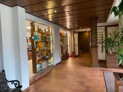 a store hallway with a pharmacyacistacistacistacist at Luxury private studio in Paradiso Verde in Bansko