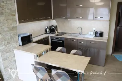 a kitchen with a sink and a counter top at Victoria apartments 1 in Velingrad