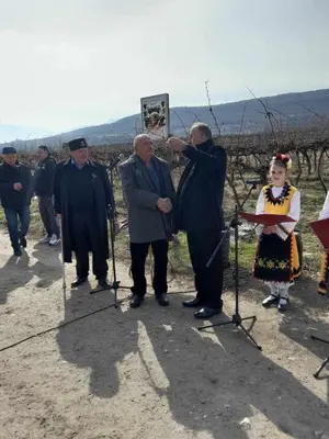 a group of people standing in front of a vineyard at Винарна-Славовица in Kalugerovo