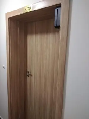 a door with a television on top of it at Borovets Gardens apartment A20 in Borovets