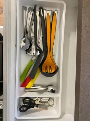 a drawer full of utensils in a drawer at Уютен апартамент на 3 мин. от главната и Капана +паркинг in Plovdiv