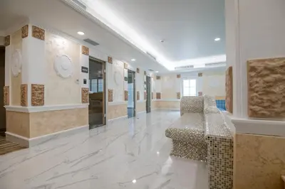 a large room with a lobby with marble floors and walls at Camping Alliance in Plovdiv