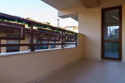 a balcony of a building with a window at Свети Никола in Razlog