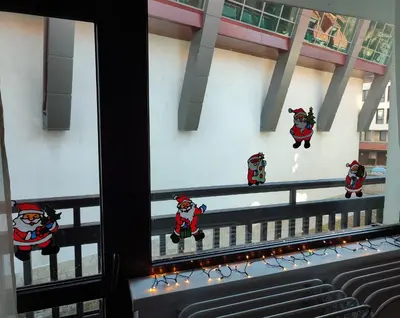 a group of santa claus ornaments on a balcony at Gondola studio ENA in Bansko