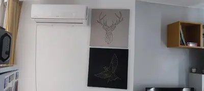 a wall with a picture of a deer on it at Gondola studio ENA in Bansko