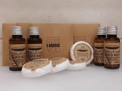 a group of four bottles of honey in a box at Ani's Guest House in Chepelare