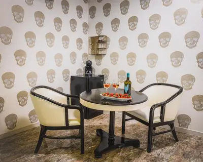 a dining room with a table and two chairs at HIDDEN BANK: First Million in Plovdiv
