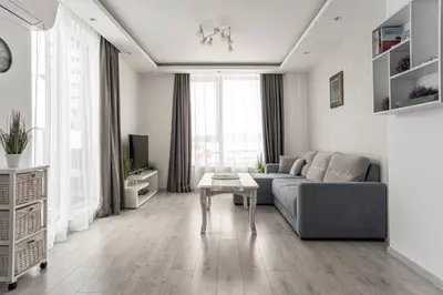 a living room with a couch and a table at Sunny & Stylish Brand new 2bdr Apartment + Parking in Sofia