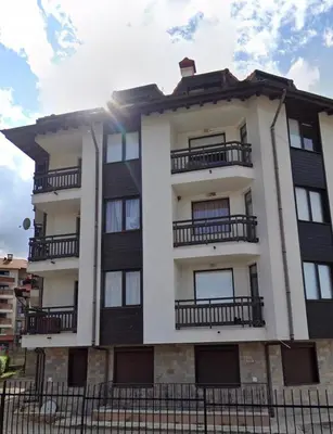 a building with balconies on the side of it at Kalina Apartment's in Bansko in Bansko
