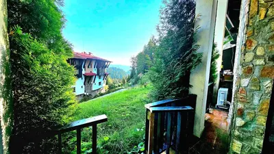 a view from an outside window of a building at Апартамент Amare, Гранд Манастира in Pamporovo