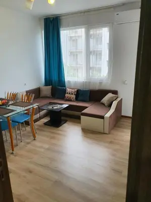 a living room with a couch and a table at THE CENTER Apartments Comfort in Sandanski