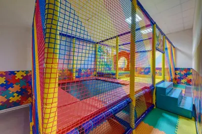 a large play room with a play structure at Skyday Penthouse Deluxe at Oak Residence in Smolyan