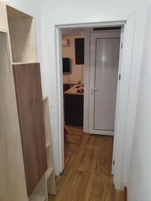 a hallway with a door leading to a room at THE CENTER Apartments Comfort 3 in Sandanski