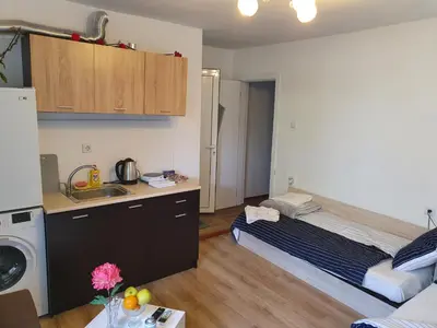 a small kitchen with a sink and a refrigerator at THE CENTER Apartments Comfort 3 in Sandanski