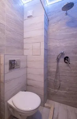 a bathroom with a toilet and a shower at Sunny Dream Apartments in Sofia