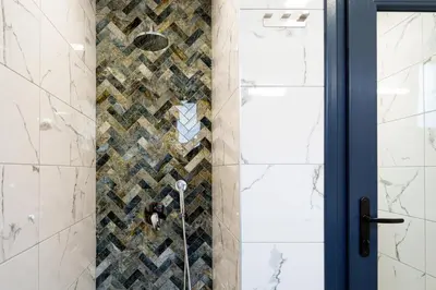 a bathroom with a shower with a glass door at Loft Apartment with a great view of Ardino in Ardino