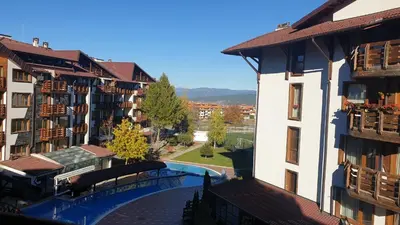 a view from the balcony of a apartment building at 500м. от лифта Сладък дом в Белведере СПА комплекс in Bansko