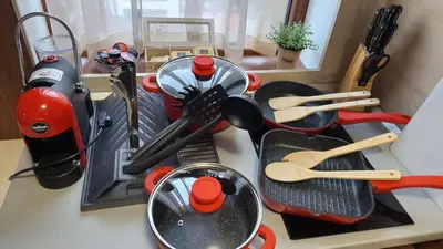 a counter top with many cooking utensils on it at Free SPA в Св. Иван Рилски - Сладък дом сред лукс in Bansko