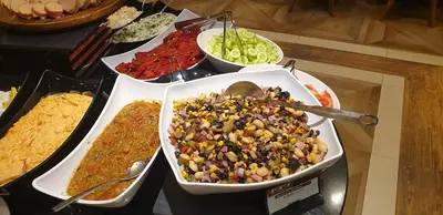 a buffet of different types of food on a table at Free SPA в Св. Иван Рилски - Сладък дом сред лукс in Bansko