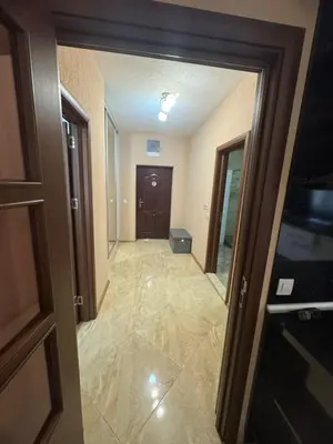 a hallway of a building with a door and a hallwayngth at Луксозен апартамент в сърцето на Сандански in Sandanski