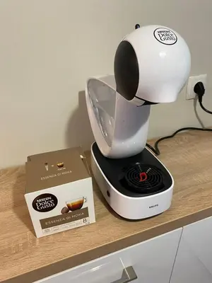 a coffee maker sitting on a counter next to a box at Modern & Central 1BR Apartment with lovely terrace in Plovdiv