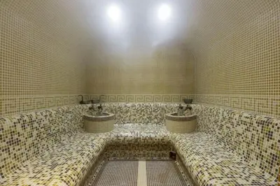 a bathroom with three sinks in a room at Boho Mountain Studio in Smolyan