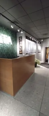 a lobby of a building with a reception desk at Apartment House - Delta in Sofia