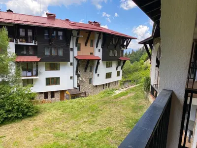 a view from the window of a building at Червената Шапчица Апартамент Гранд Манастира in Pamporovo